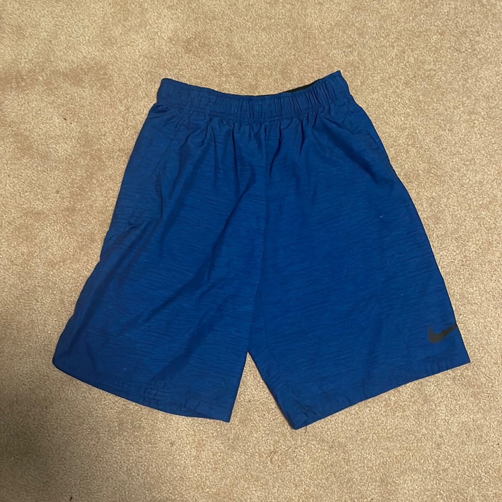 Men’s Nike Dri-Fit shorts, 8” inseam and in great condition.